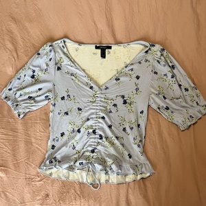 Flower patterned periwinkle shirt
